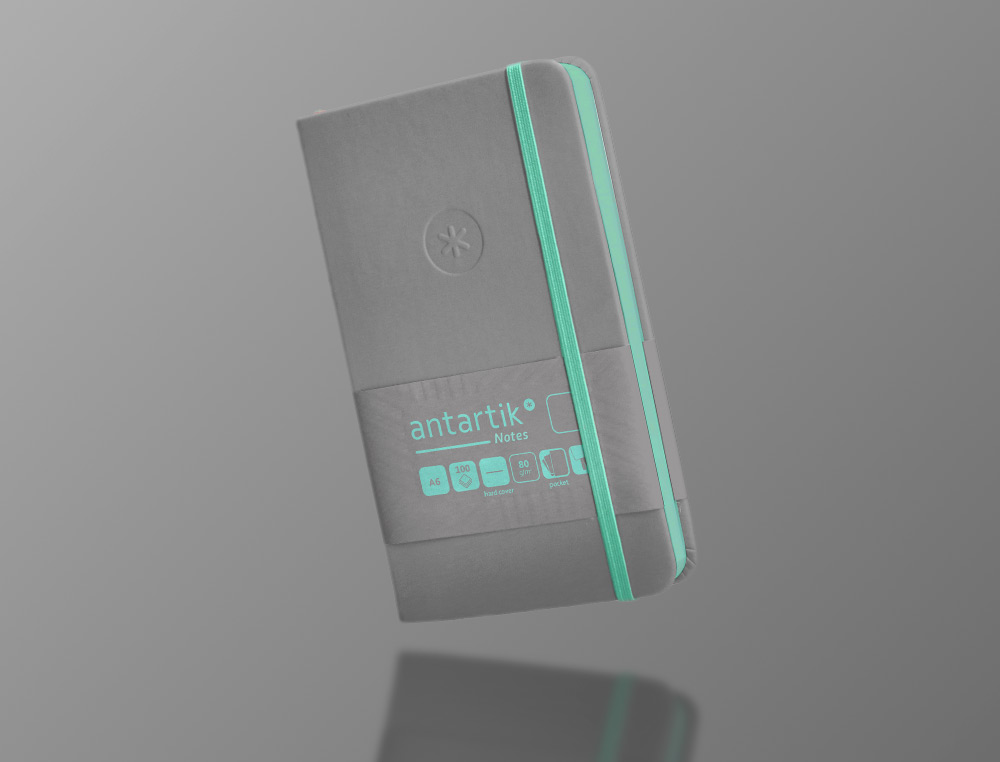 CADERNO COM ELASTICO ANTARTIK NOTES CAPA DURA A6 LISO CINZA E TURQUESA 100 FOLHAS 80 GR FSC